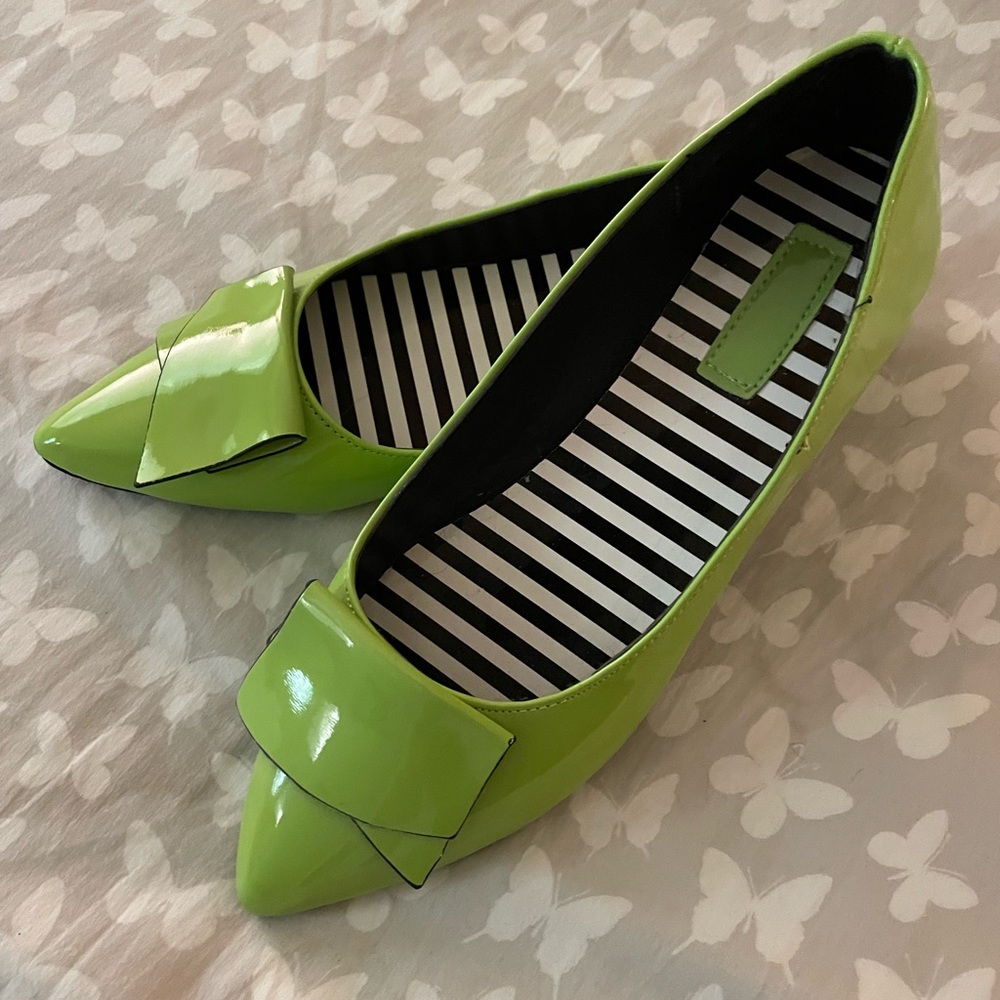 Lime green patent leather flats with fold detail